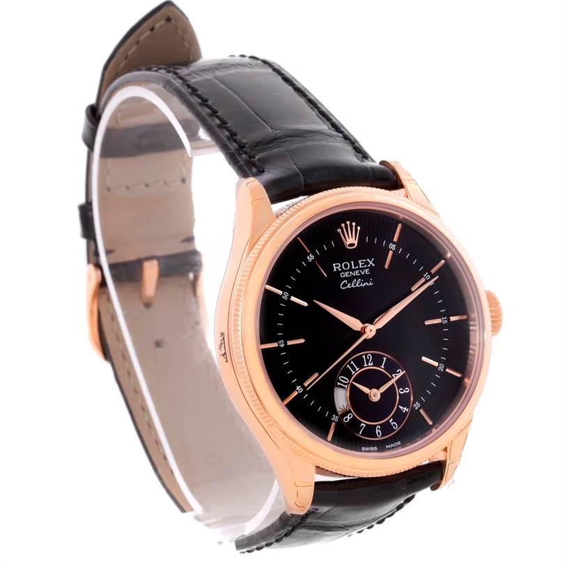 The Rolex Cellini 50525 Men's Rose Gold Black Dial 50525 Men's Rose Gold Black Dial watch is shown at an oblique angle, displaying its black dial, rose gold case, and black leather strap.