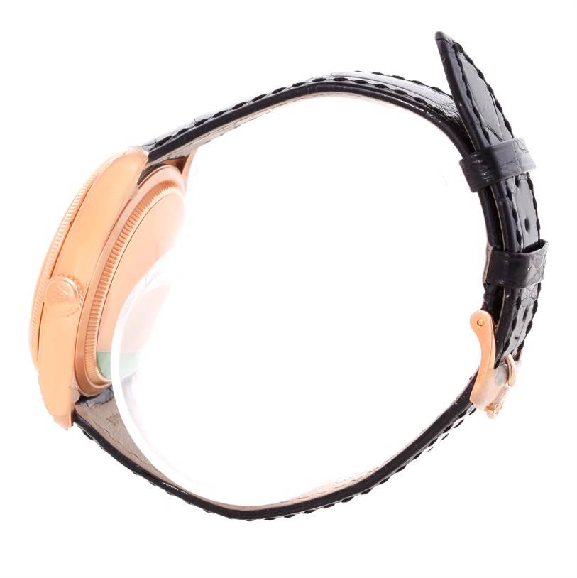 The image shows a side view of a Rolex Cellini 50525 Men's Rose Gold Black Dial 50525 Men's Rose Gold Black Dial watch, highlighting its black leather strap and rose gold case.