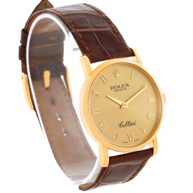 The image shows a side and front view of the Rolex Cellini 5115 Men
s Yellow Gold Champagne Dial 5115 Men
s Yellow Gold Champagne Dial watch, highlighting its dial, case, and leather strap.