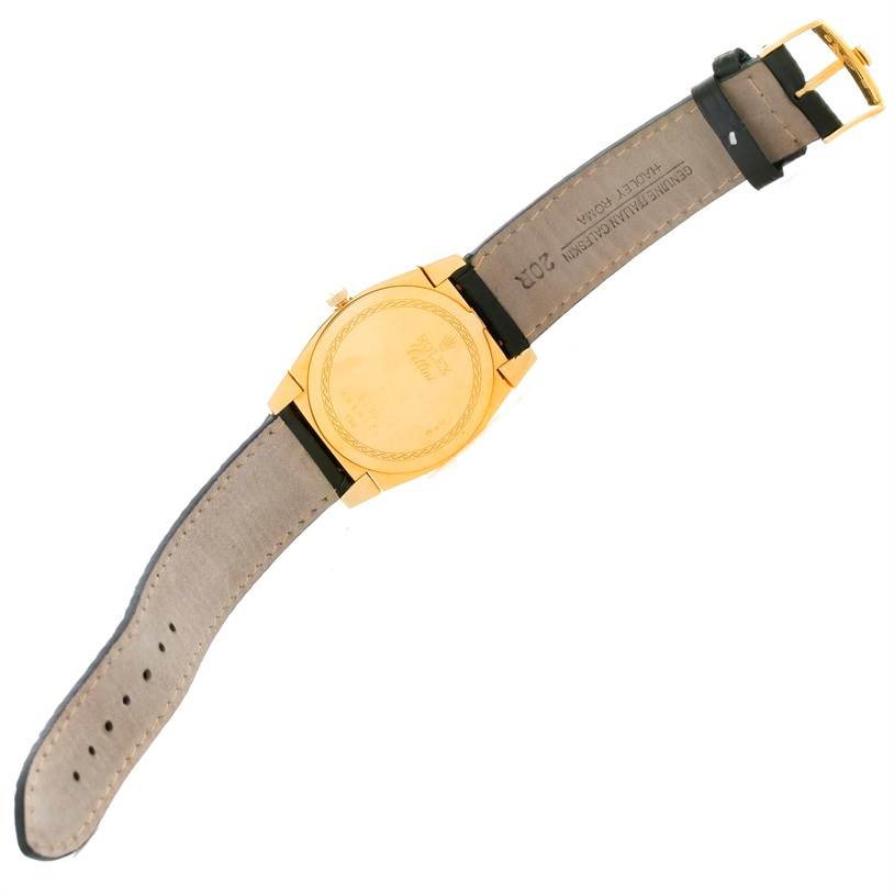 The image shows the back view of a Rolex Cellini 5330 Men's Yellow Gold White Dial 5330 Men's Yellow Gold White Dial watch, featuring the case back, strap, and buckle.