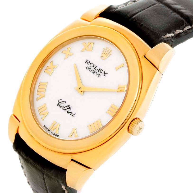 The image shows a close-up, angled view of a Rolex Cellini 5330 Men's Yellow Gold White Dial 5330 Men's Yellow Gold White Dial watch featuring a gold case, white dial, Roman numerals, and a black leather strap.