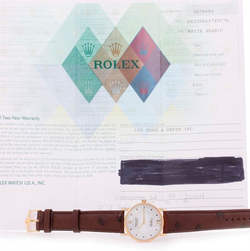The image shows a Rolex Cellini 5115 Men
s Yellow Gold Silver Dial 5115 Men
s Yellow Gold Silver Dial watch positioned horizontally, with its certificate of Best Quality
ity behind it.