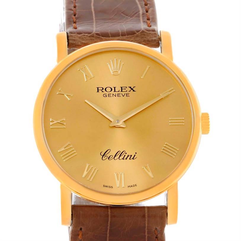 This image shows a front view of a Rolex Cellini 5115 Men
s Yellow Gold Champagne Dial 5115 Men
s Yellow Gold Champagne Dial watch with a gold dial and brown leather strap.
