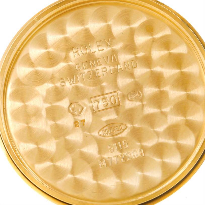 The image shows the inside of a Cellini model case back by Rolex, featuring engravings and hallmarks.