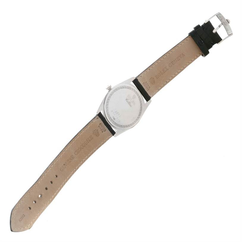 This image shows the Rolex Cellini 4233 Men
s White Gold White Dial 4233 Men
s White Gold White Dial watch from the back, displaying the caseback, leather strap, and buckle.
