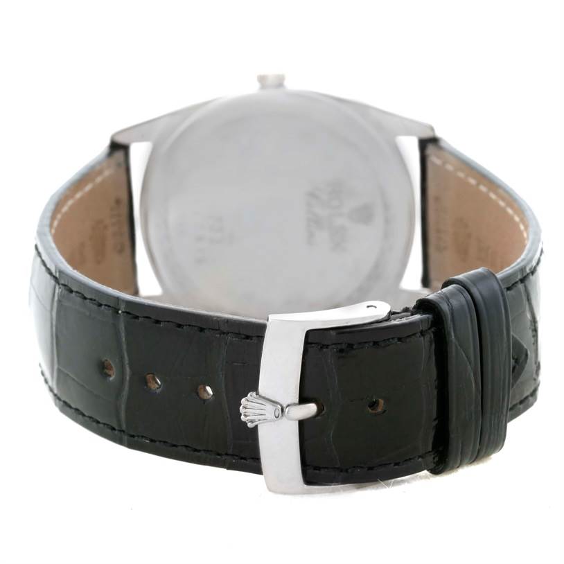 The image shows the back view of a Rolex Cellini 4233 Men
s White Gold White Dial 4233 Men
s White Gold White Dial watch, focusing on the strap, buckle, and case back.