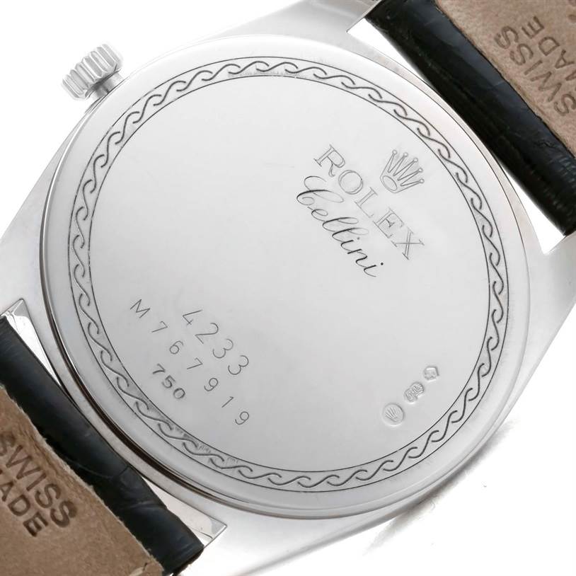 This image shows the back case of the Rolex Cellini 4233 Men
s White Gold White Dial 4233 Men
s White Gold White Dial watch, displaying the model name and serial number.