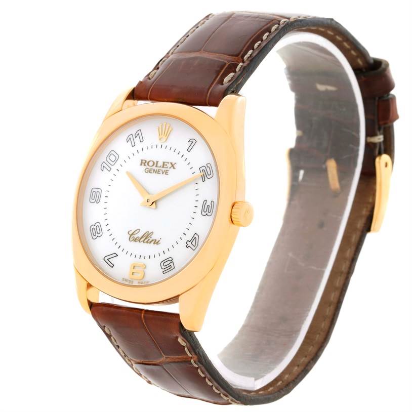This image shows a Rolex Cellini 4233 Men's Yellow Gold White Dial 4233 Men's Yellow Gold White Dial watch at a slight angle, displaying its face, case, crown, and leather strap.
