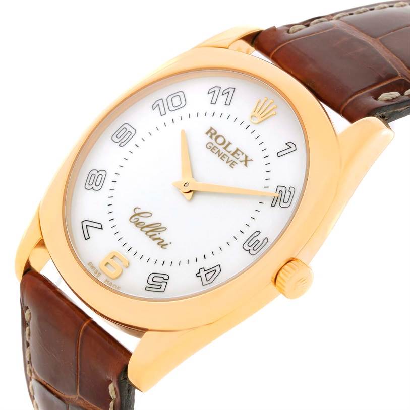 This image shows a close-up of a Rolex Cellini 4233 Men's Yellow Gold White Dial 4233 Men's Yellow Gold White Dial watch, displaying its face, crown, and part of the leather strap.