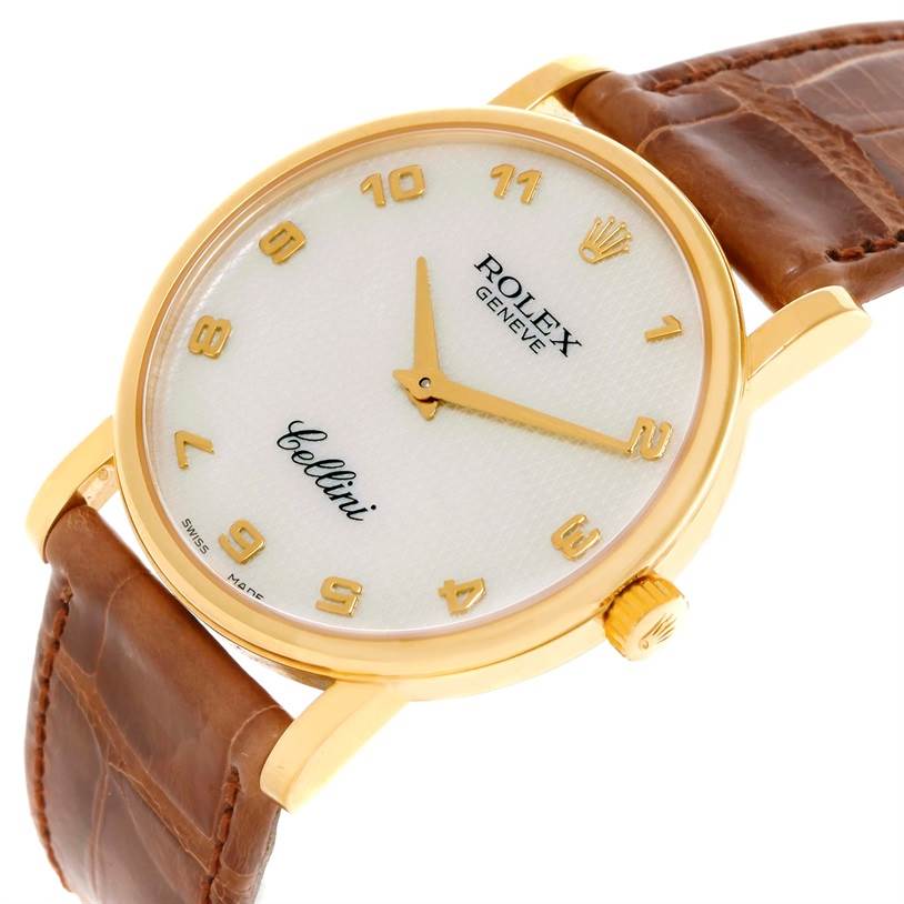 The Rolex Cellini 5115 Men
s Yellow Gold Mother of Pearl Dial 5115 Men
s Yellow Gold Mother of Pearl Dial watch is shown at a slight angle, highlighting the front face, crown, and leather strap.
