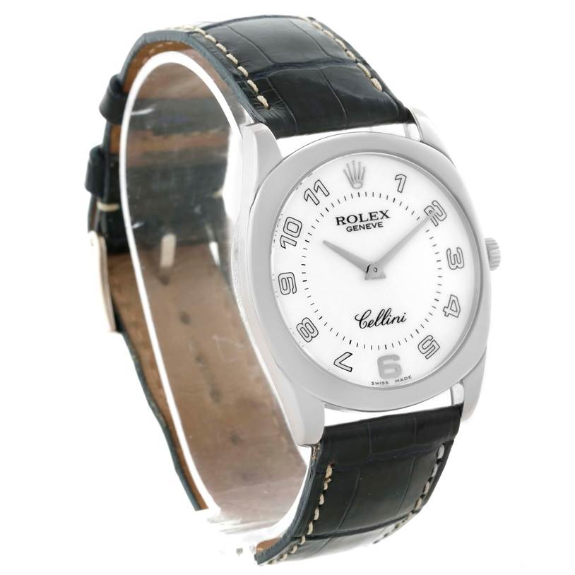 This image shows a Rolex Cellini 4233 Men
s White Gold White Dial 4233 Men
s White Gold White Dial watch from a three-quarter angle, highlighting its face, bezel, crown, and leather strap.