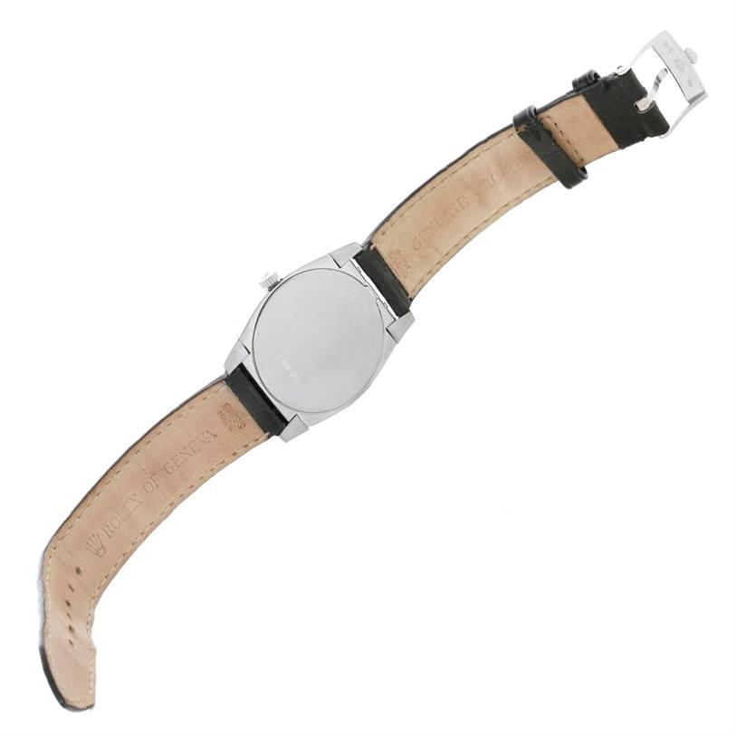 This is a Rolex Cellini 5320 Men's White Gold Mother of Pearl Dial 5320 Men's White Gold Mother of Pearl Dial watch shown from the back, displaying the case back and leather strap.