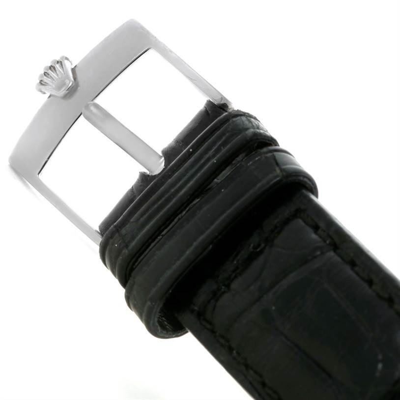 The image shows the buckle and strap of a Rolex Cellini 5320 Men's White Gold Mother of Pearl Dial 5320 Men's White Gold Mother of Pearl Dial watch, highlighting the crown logo on the buckle.