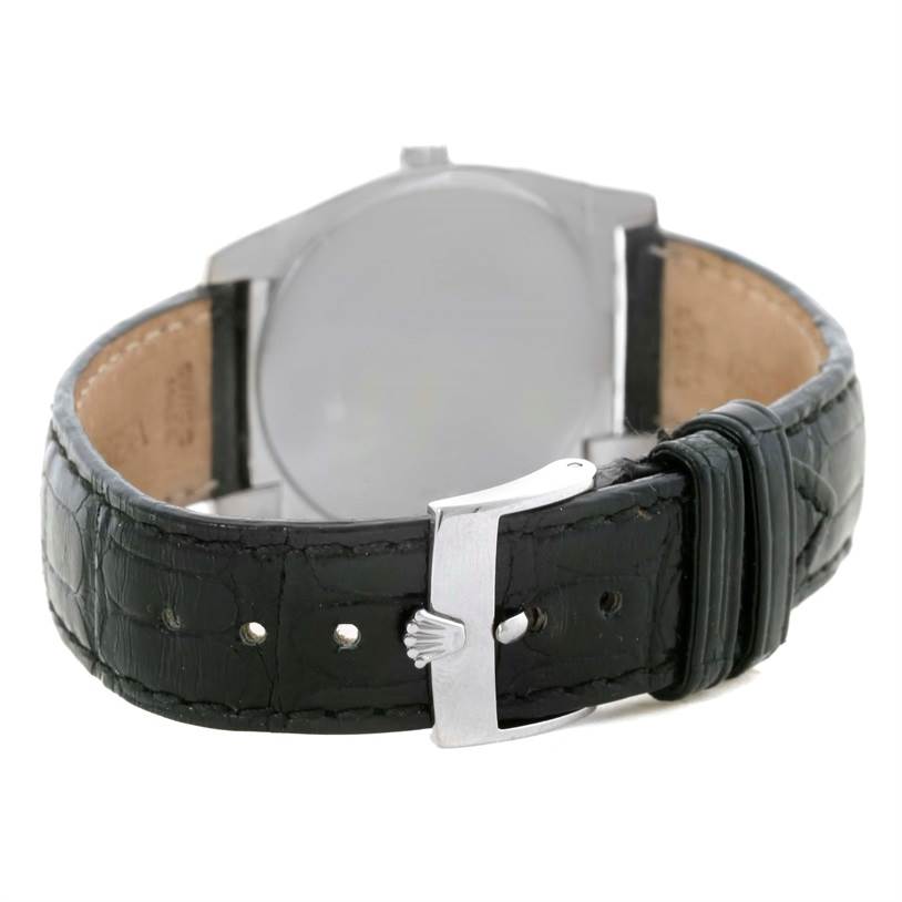 The image shows the back of a Rolex Cellini 5320 Men's White Gold Mother of Pearl Dial 5320 Men's White Gold Mother of Pearl Dial watch, focusing on the black leather strap and silver buckle.