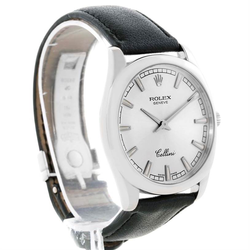The image shows a side-profile angle of a Rolex Cellini 4243 Men
s White Gold Silver Dial 4243 Men
s White Gold Silver Dial watch, highlighting its face, bezel, and black leather strap.