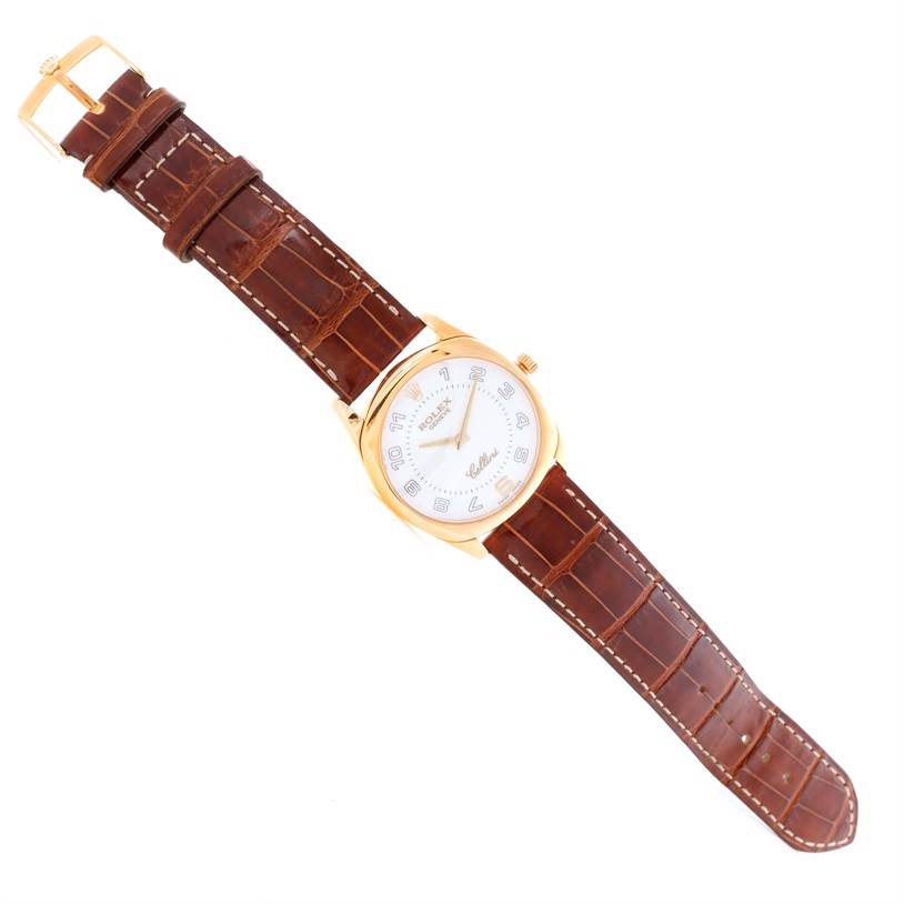 This image shows a full frontal view of a Rolex Cellini 4233 Men's Yellow Gold White Dial 4233 Men's Yellow Gold White Dial watch, featuring its dial, case, and leather strap.