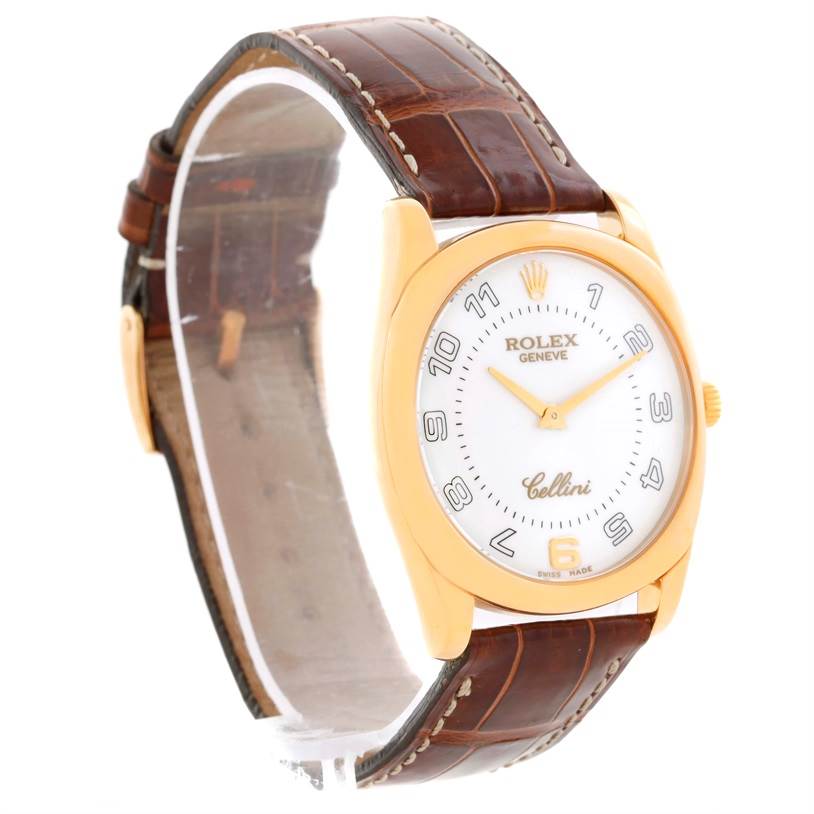 This image shows a Rolex Cellini 4233 Men's Yellow Gold White Dial 4233 Men's Yellow Gold White Dial watch at an angled side view, highlighting its brown leather strap, gold case, and white dial.