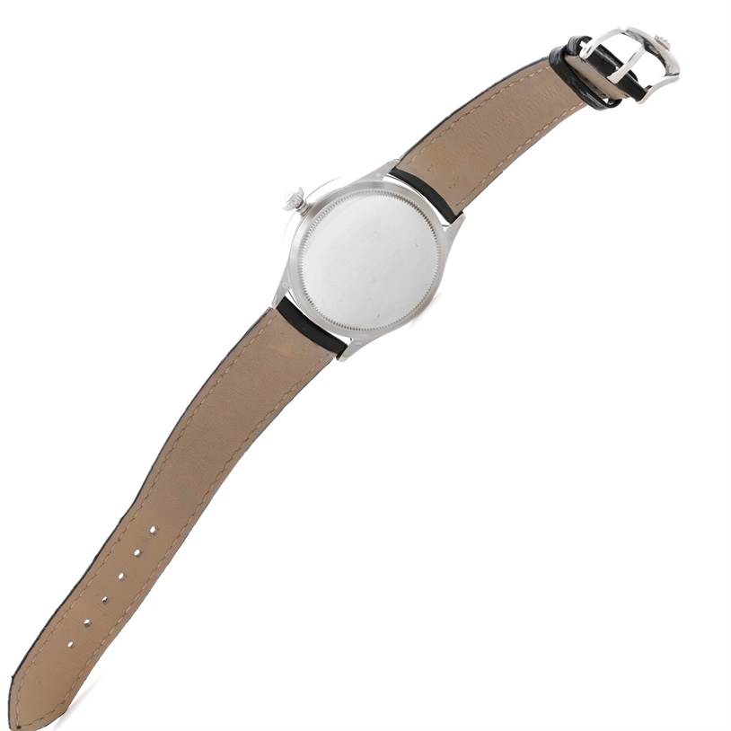 The image shows the back view of a Rolex Cellini 50529 Men's White Gold Silver Dial 50529 Men's White Gold Silver Dial watch with its leather strap fully extended.