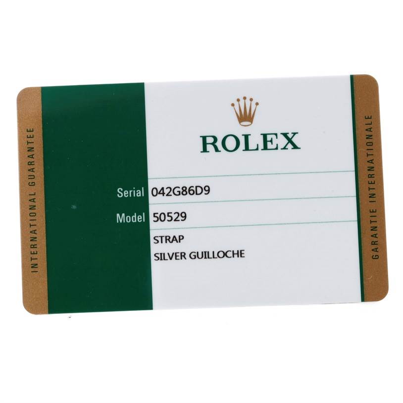 The image shows a Rolex International Guarantee card for the Cellini model with serial number 042G86D9 and model number 50529.