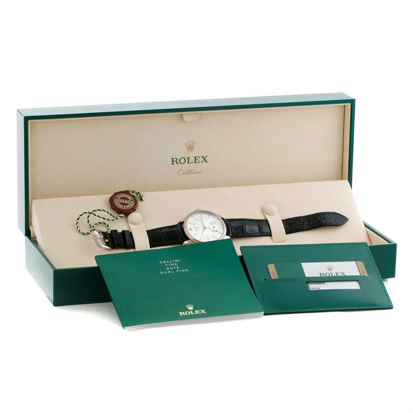 The image shows a Rolex Cellini 50529 Men's White Gold Silver Dial 50529 Men's White Gold Silver Dial watch from a front angle, along with its box, booklet, and warranty card holder.