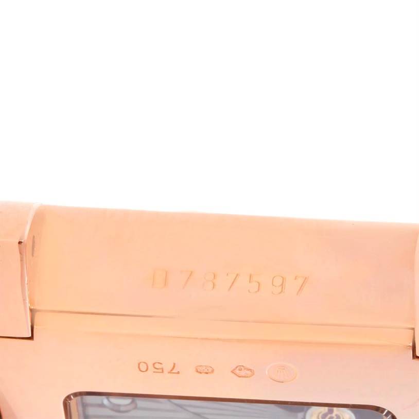 This image shows the back case of a Rolex Cellini 5442.5 Men's Rose Gold Black Dial 5442.5 Men's Rose Gold Black Dial watch with visible engravings and part of the mechanism.