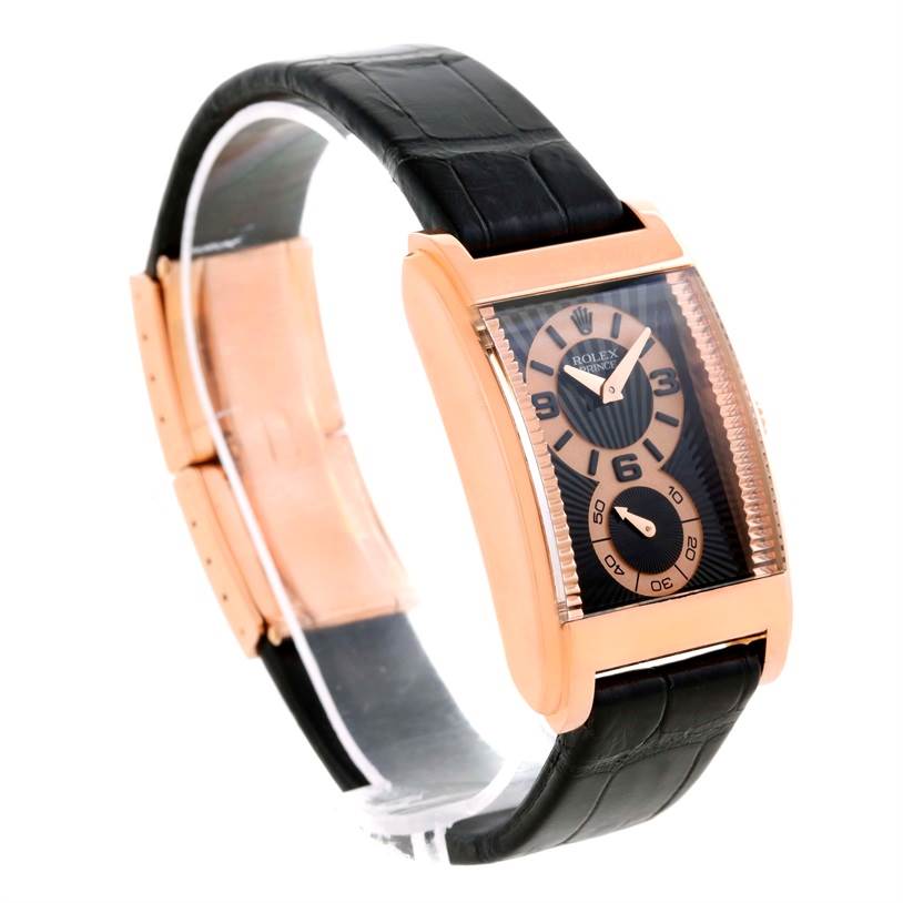 The image shows a side-angle view of a Rolex Cellini 5442.5 Men's Rose Gold Black Dial 5442.5 Men's Rose Gold Black Dial watch, highlighting its black strap and rose gold rectangular case.