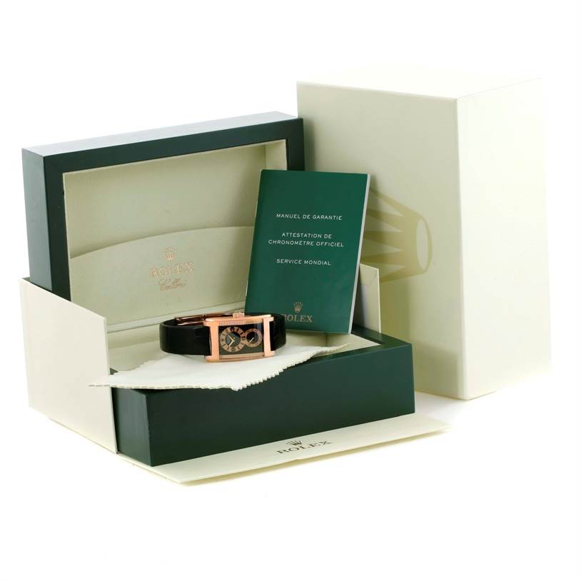 The image shows a Rolex Cellini 5442.5 Men's Rose Gold Black Dial 5442.5 Men's Rose Gold Black Dial watch in its box, along with an instruction manual and official chronometer certification.