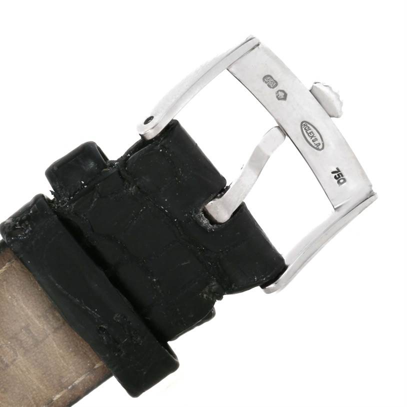 This image shows a close-up of the buckle and leather strap of a Rolex Cellini 4233 Men's White Gold White Dial 4233 Men's White Gold White Dial watch.