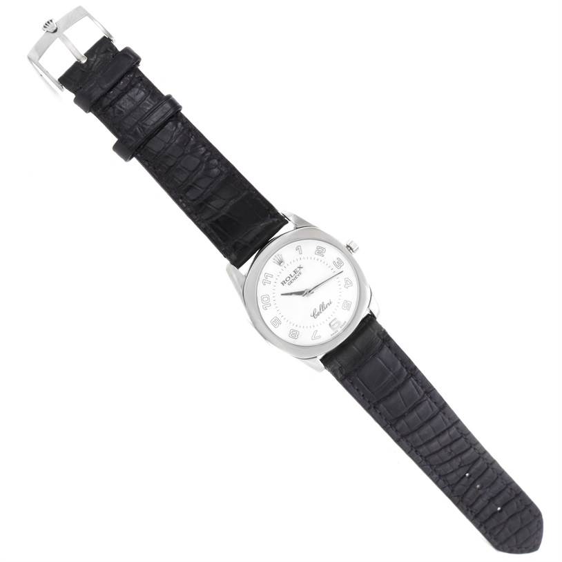 The image shows a top view of a Rolex Cellini 4233 Men's White Gold White Dial 4233 Men's White Gold White Dial watch, displaying the dial, case, and leather strap.