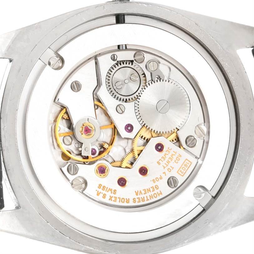 This image shows the intricate internal mechanism of a Rolex Cellini 4233 Men's White Gold White Dial 4233 Men's White Gold White Dial watch from a top-down angle.