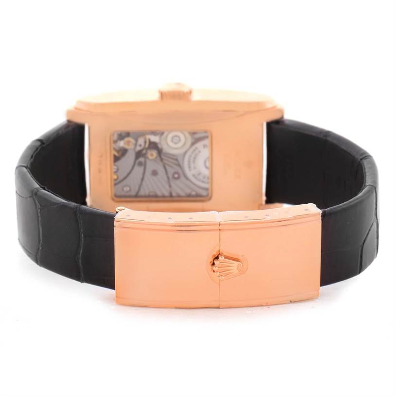 The image shows the back view of a Rolex Cellini 5442 Men's Rose Gold Black Dial 5442 Men's Rose Gold Black Dial watch, highlighting its clasp, case back, and part of the leather strap.