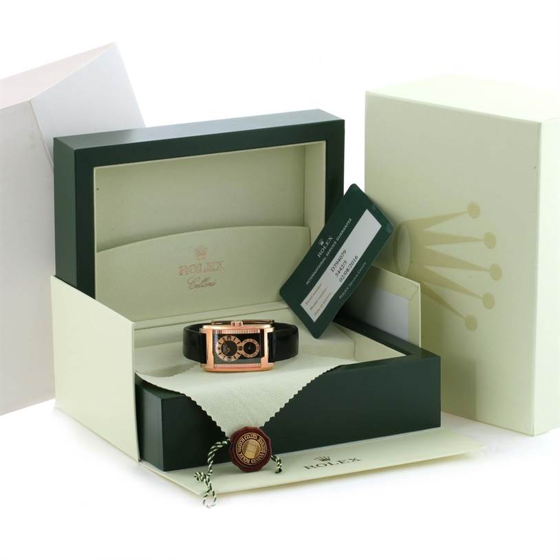 The image shows a Rolex Cellini 5442 Men's Rose Gold Black Dial 5442 Men's Rose Gold Black Dial watch with its box, authenticity card, and a medallion, all displayed from a front angle.