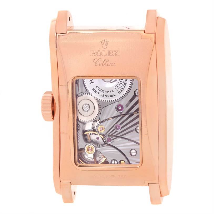 This image shows the back of a Rolex Cellini 5442 Men's Rose Gold Black Dial 5442 Men's Rose Gold Black Dial watch, highlighting the mechanical movement through a transparent case back.