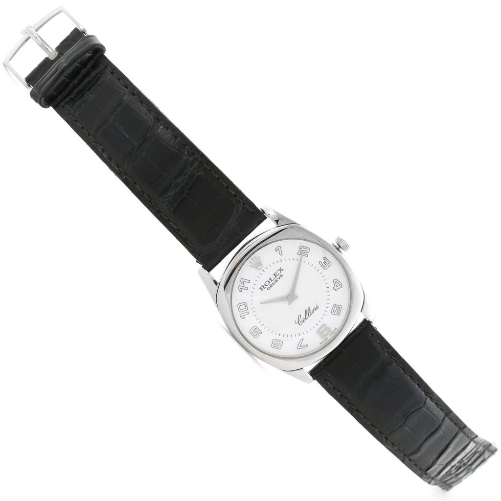 The image shows a top view of a Rolex Cellini 4233 Men's White Gold White Dial 4233 Men's White Gold White Dial watch with a black leather strap and a silver round dial.