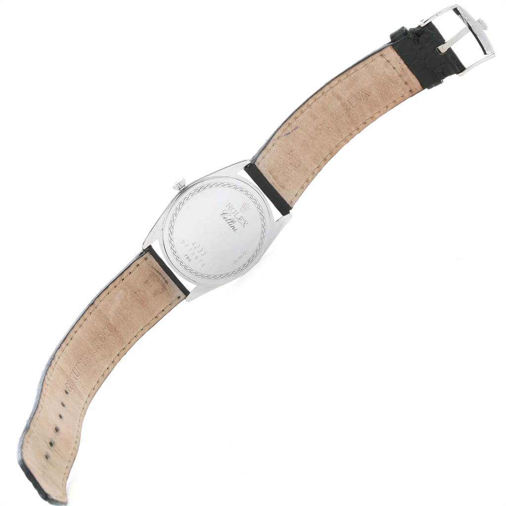 The image shows the back and straps of a Rolex Cellini 4233 Men's White Gold White Dial 4233 Men's White Gold White Dial model watch from a top-down angle.