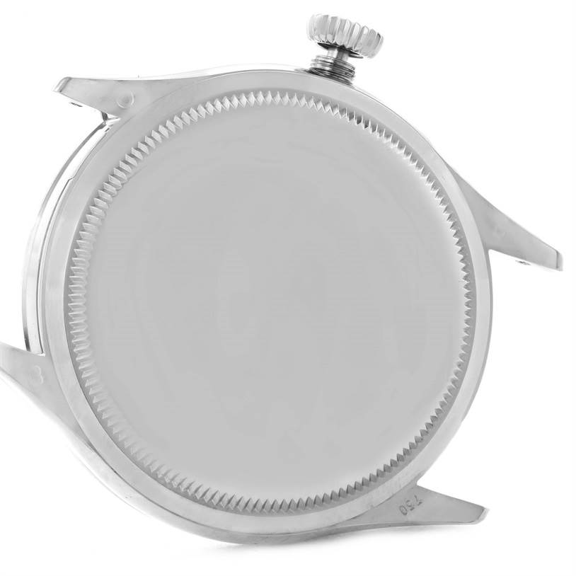 The image shows the caseback and crown of a Rolex Cellini 50509 Men's White Gold White Dial 50509 Men's White Gold White Dial watch, viewed from the back.