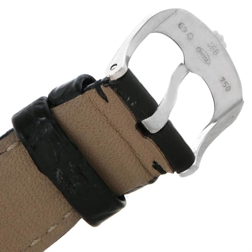 The image shows a close-up of the clasp and part of the leather strap of a Rolex Cellini 50509 Men's White Gold White Dial 50509 Men's White Gold White Dial model watch.