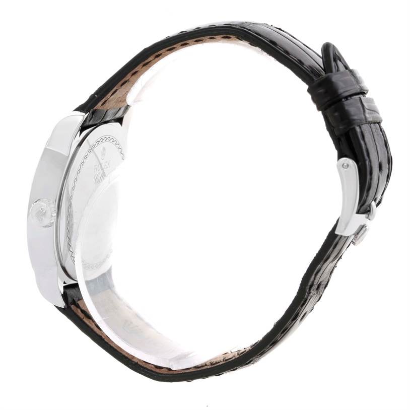 This image shows a side view of a Rolex Cellini 5240 Men
s Platinum Mother of Pearl Dial 5240 Men
s Platinum Mother of Pearl Dial watch, highlighting the case, crown, and leather strap.