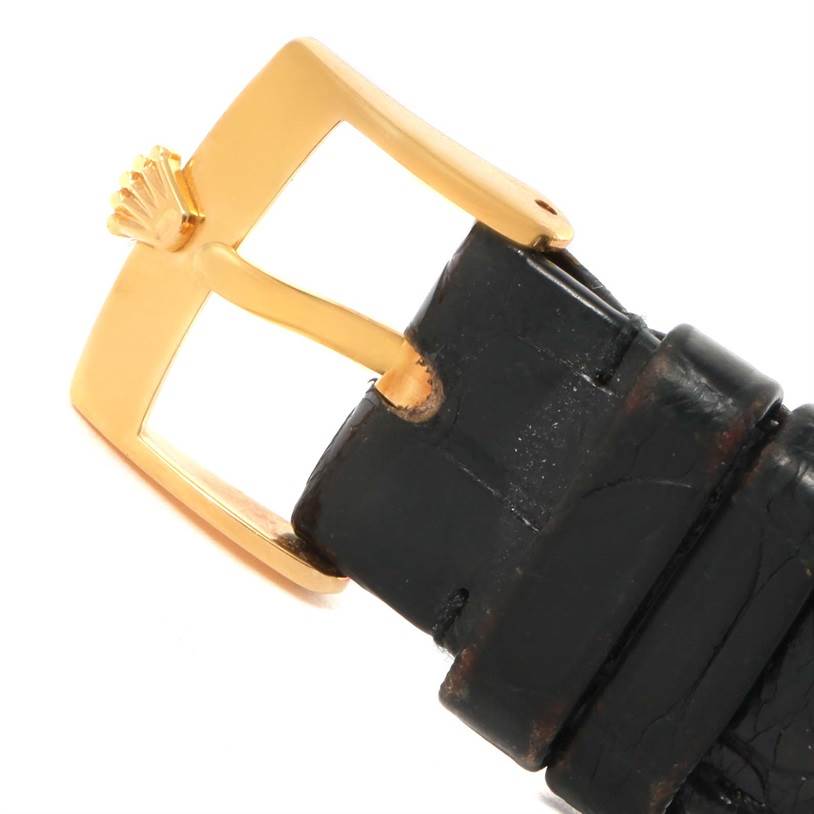 This image shows a close-up of the buckle and strap of a Rolex Cellini 5115 Yellow Gold Mother of Pearl Dial 5115 Yellow Gold Mother of Pearl Dial watch.