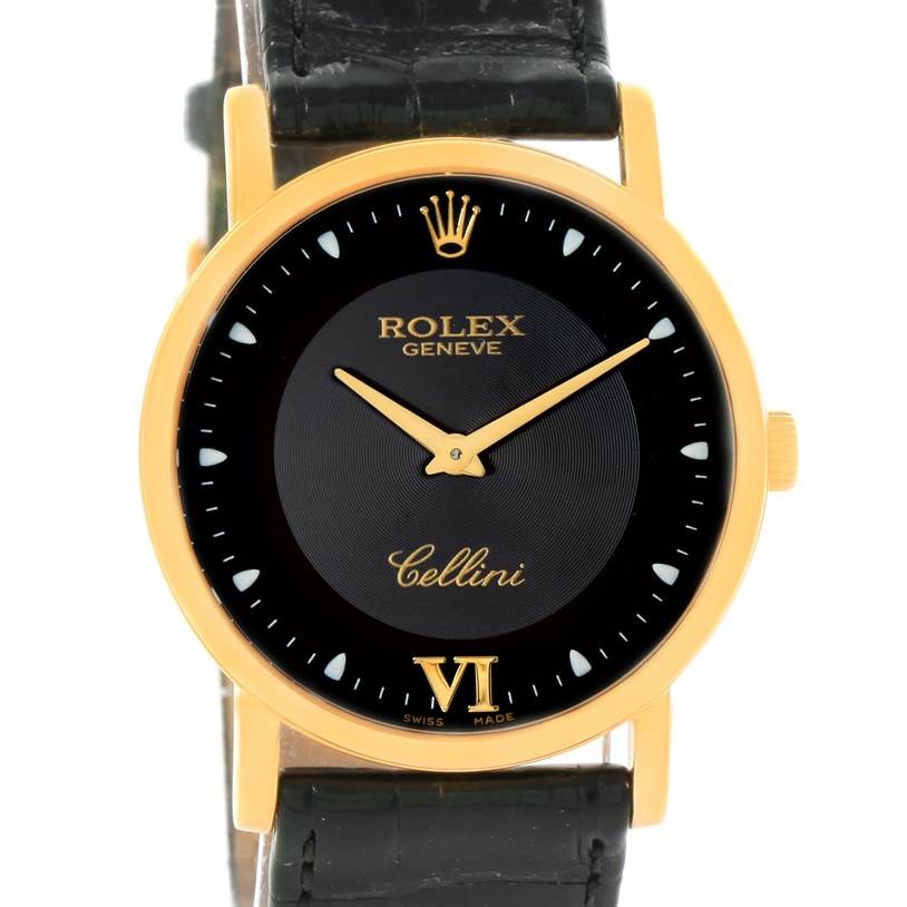 The image shows a Rolex Cellini 5115 Yellow Gold Black Dial 5115 Yellow Gold Black Dial watch from a front angle, featuring its black dial, gold hands, and black leather strap.