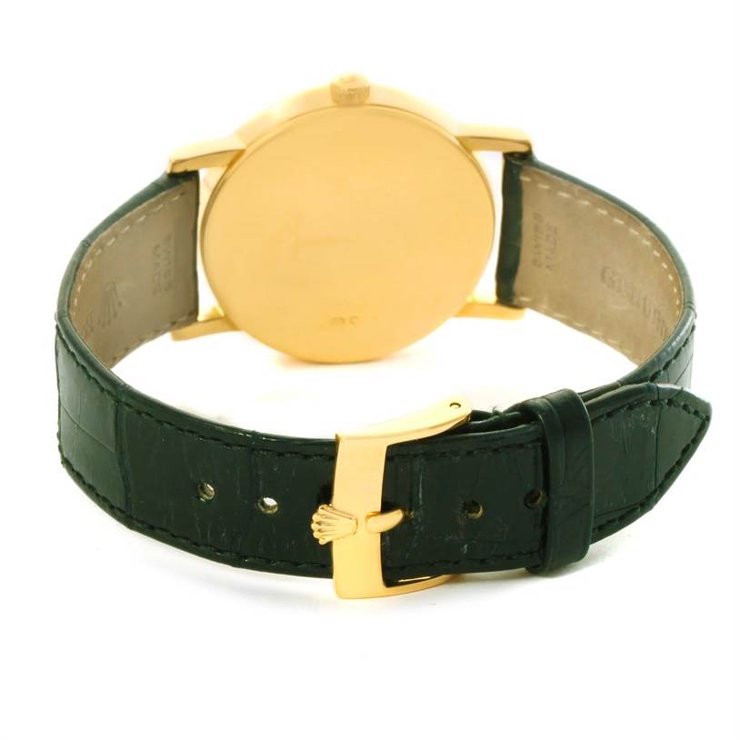 This image shows the back case and leather strap of a Rolex Cellini 5115 Yellow Gold Black Dial 5115 Yellow Gold Black Dial watch from a rear angle.