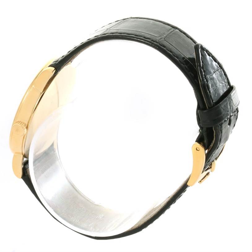 Side view of the Rolex Cellini 5115 Yellow Gold Black Dial 5115 Yellow Gold Black Dial watch, showcasing the case and black leather strap.