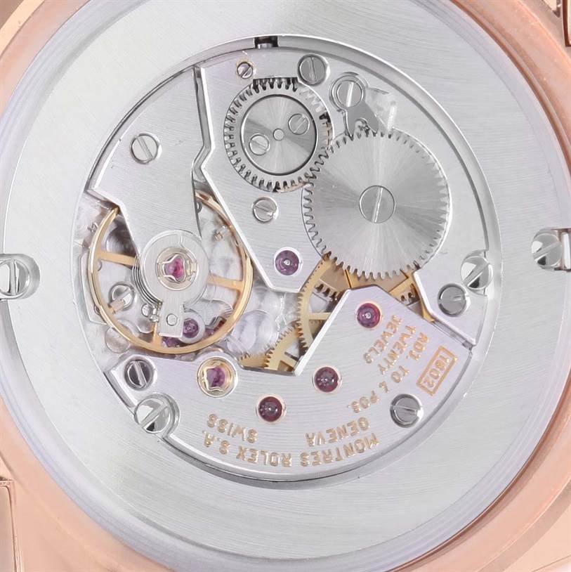 The image shows the intricate internal mechanics of a Rolex Cellini 5330 Rose Gold White Dial 5330 Rose Gold White Dial model watch from a rear angle.