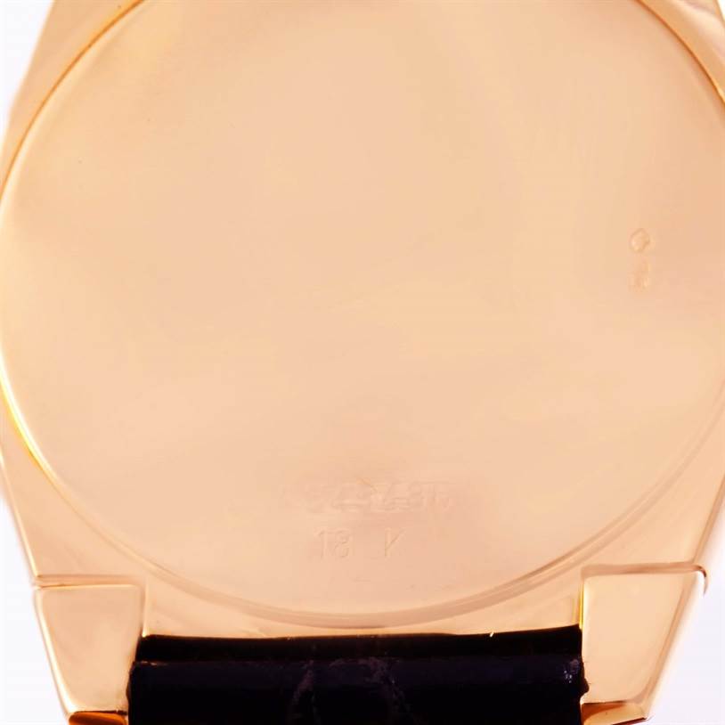 The image shows the back case of a Rolex Cellini 5330 Rose Gold White Dial 5330 Rose Gold White Dial watch, highlighting its 18K gold material, captured from a rear angle.