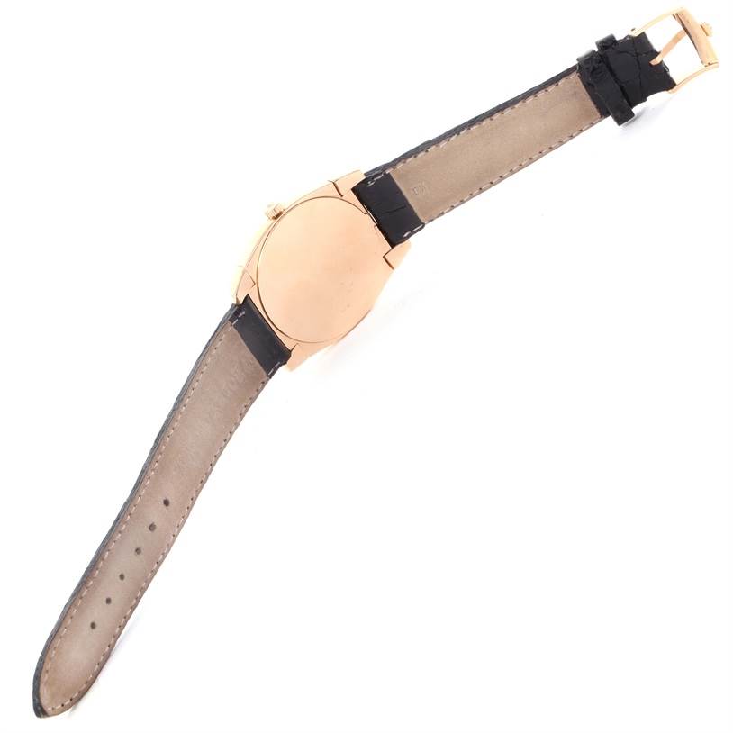 The image shows the back view of a Rolex Cellini 5330 Rose Gold White Dial 5330 Rose Gold White Dial watch, highlighting its case, crown, and leather strap.