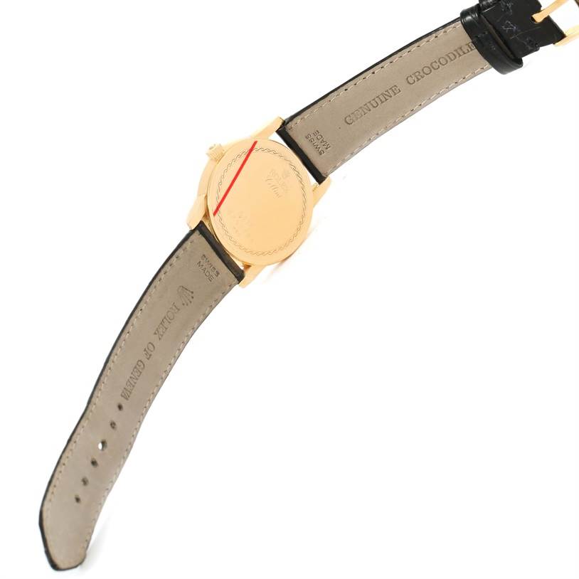 The image shows the back of the Rolex Cellini 5116 Men's Yellow Gold Beige Dial 5116 Men's Yellow Gold Beige Dial watch with the strap fully extended and text indicating "GENUINE CROCODILE."