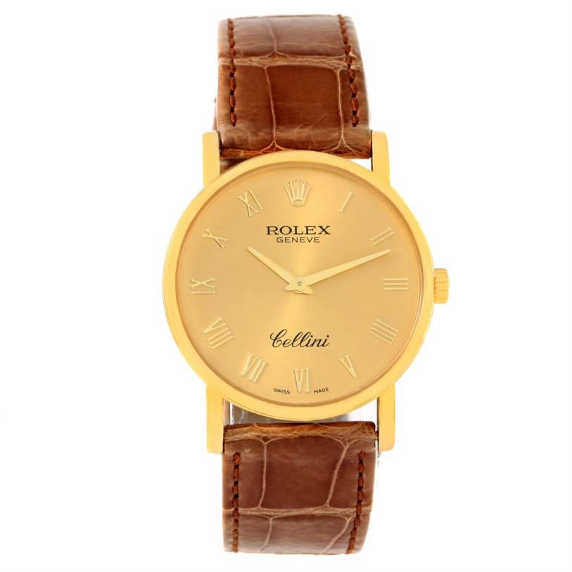 This image shows a front view of the Rolex Cellini 5115 Men
s Yellow Gold Champagne Dial 5115 Men
s Yellow Gold Champagne Dial watch, highlighting its gold dial, Roman numerals, and brown leather strap.