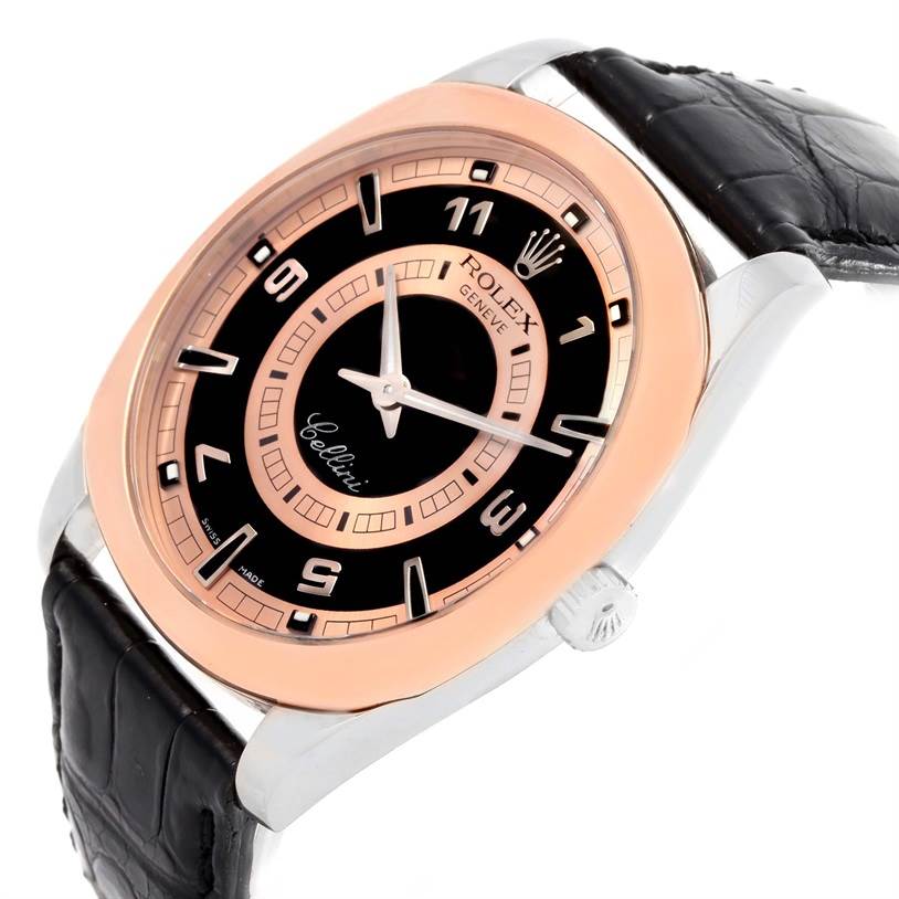 The image shows a close-up, angled view of a Rolex Cellini 4243 Men
s White Gold Black Dial 4243 Men
s White Gold Black Dial watch, highlighting the face, bezel, and part of the leather strap.
