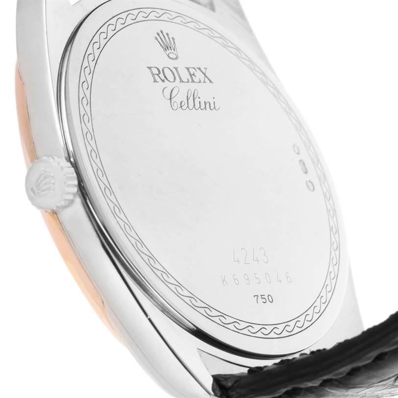 The image shows the back case and crown of the Rolex Cellini 4243 Men
s White Gold Black Dial 4243 Men
s White Gold Black Dial watch at an angled perspective.
