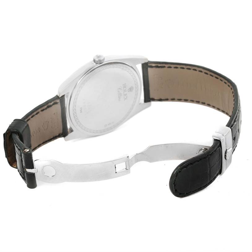 This image shows the back, side, and leather strap of the Rolex Cellini 4243 Men
s White Gold Black Dial 4243 Men
s White Gold Black Dial watch.